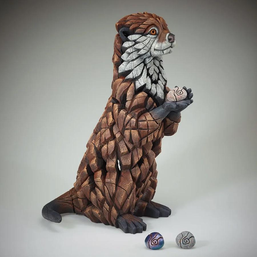 Otter Sculpture With Pebbles